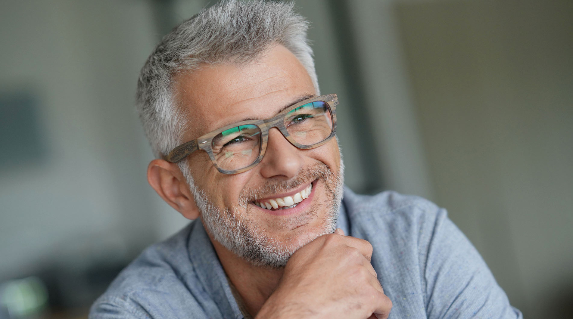 Man smiling after root canal treatment